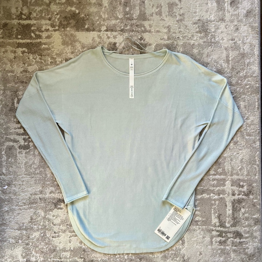 Brand new Lululemon Take it all in sweater, size 6
